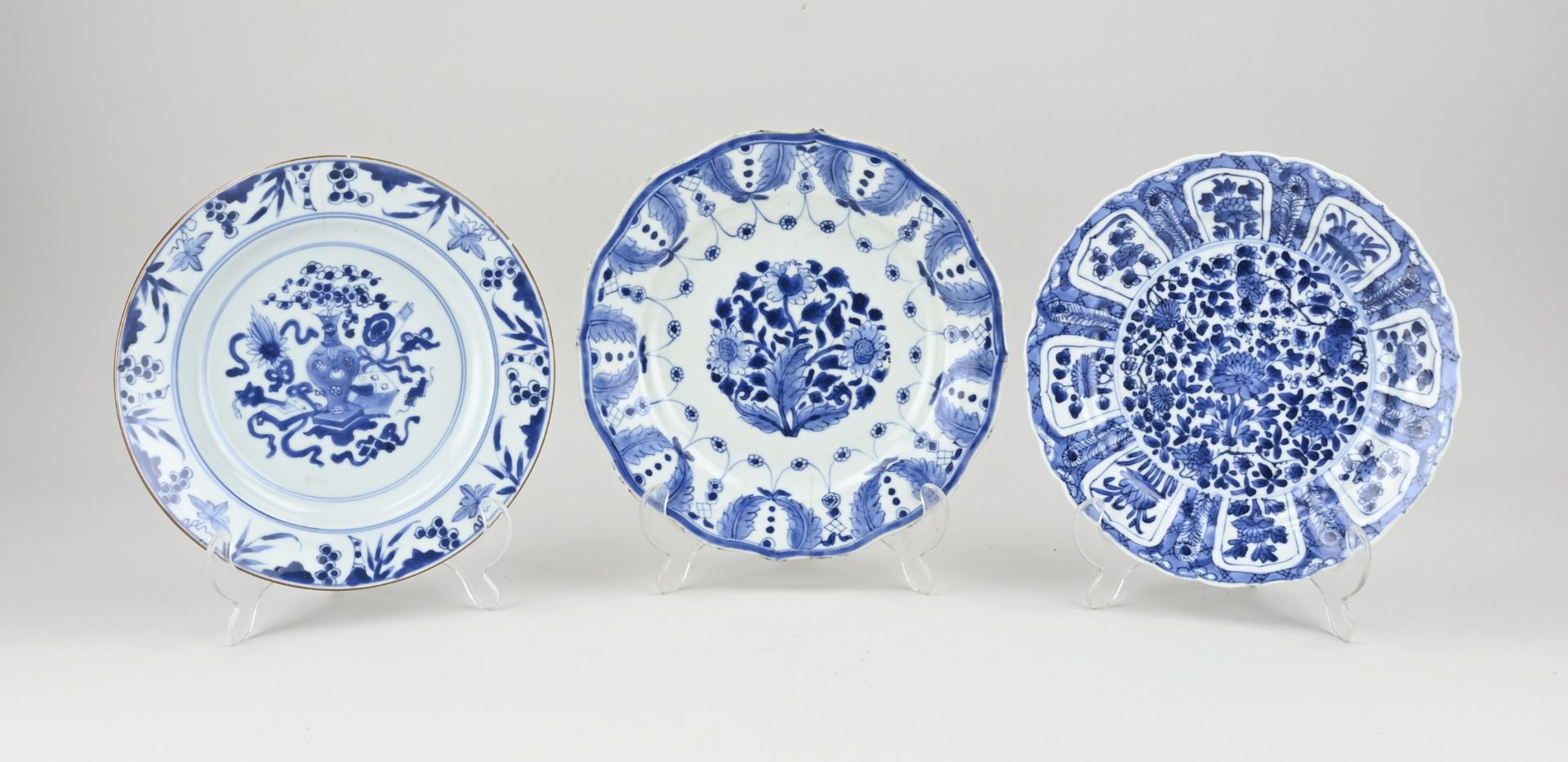 Three 18th century Chinese plates Ø 22.5 - 23.5 cm.