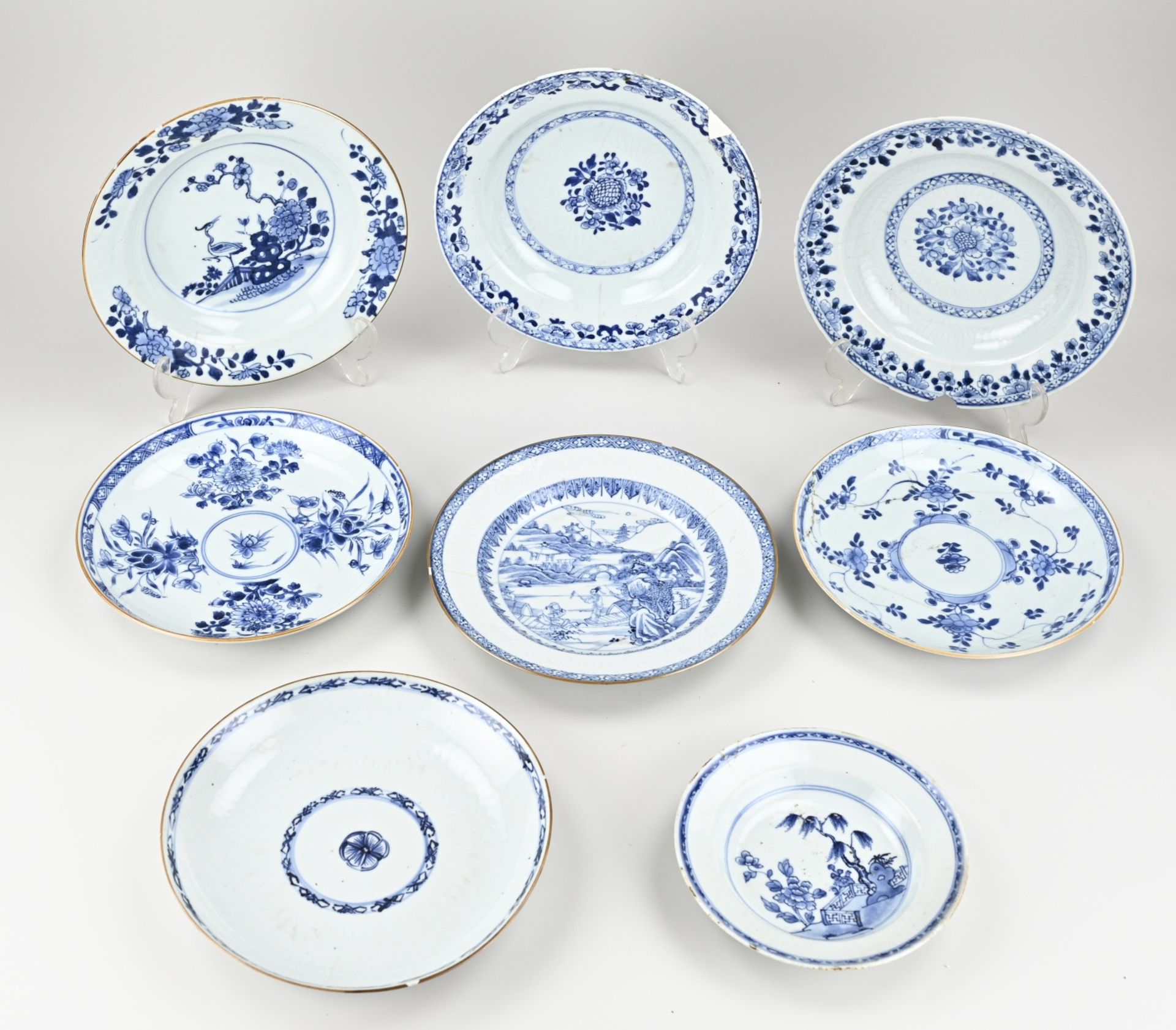 Eight 18th century Chinese plates Ø 16.5 - 22 cm.