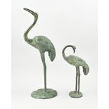 Two bronze cranes, H 40 - 80 cm.