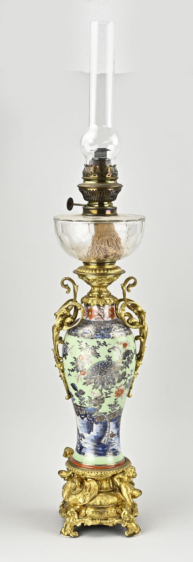 Antique oil lamp with Chinese vase, H 70 cm.