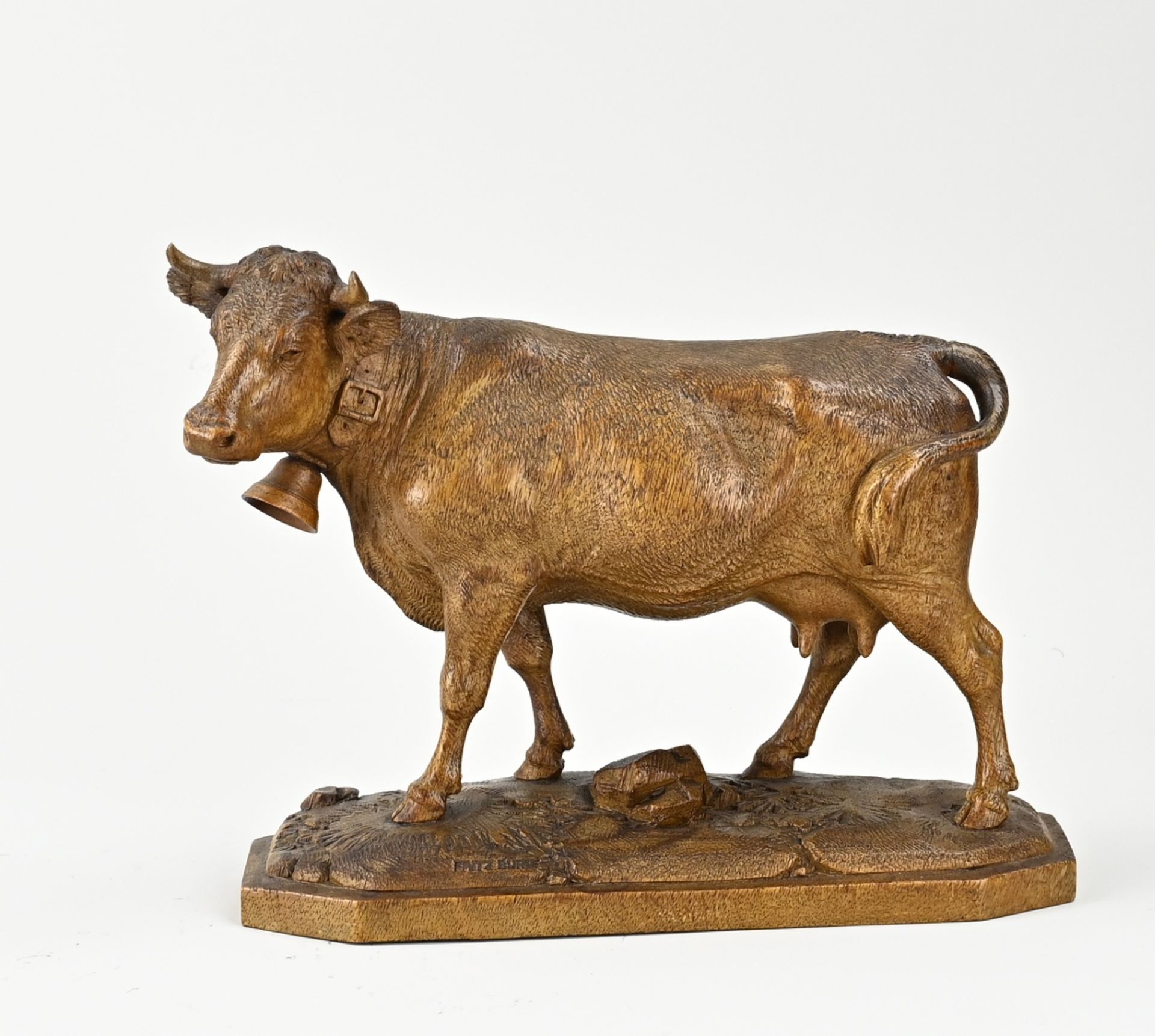 Wood carved cow by Fritz Buri