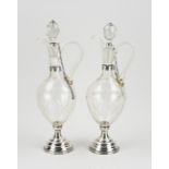 2x Decanter with silverware