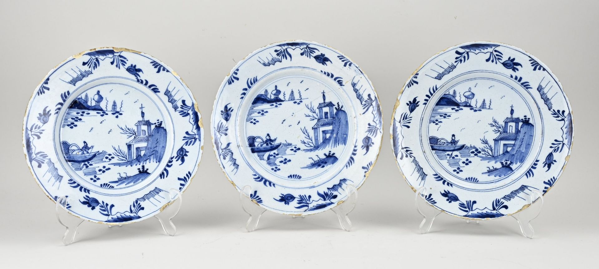 Three Delft plates Ø 22.7 cm.