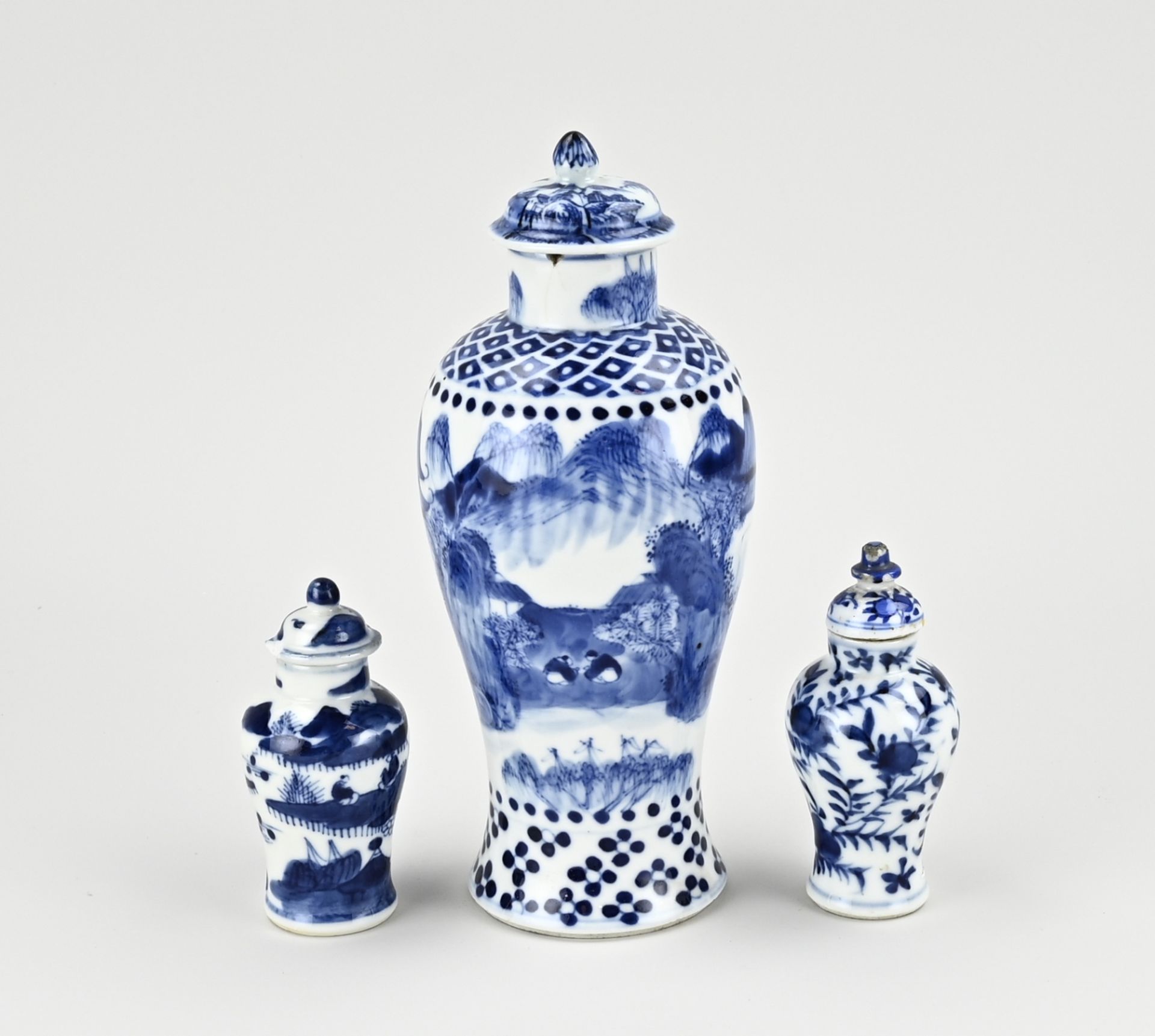 Three Chinese lidded vases, H 10 - 21 cm.