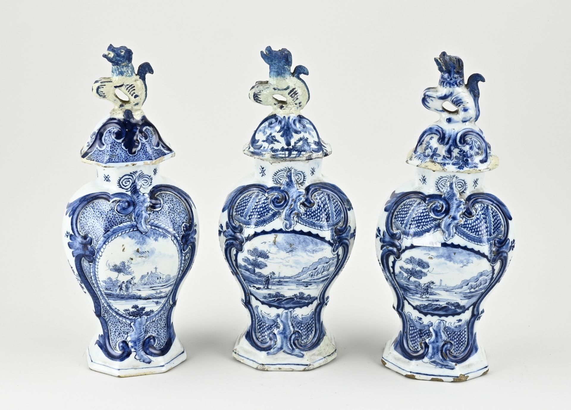 Three Delft vases with lids, H 31 cm.