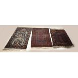 Three hand-knotted rugs
