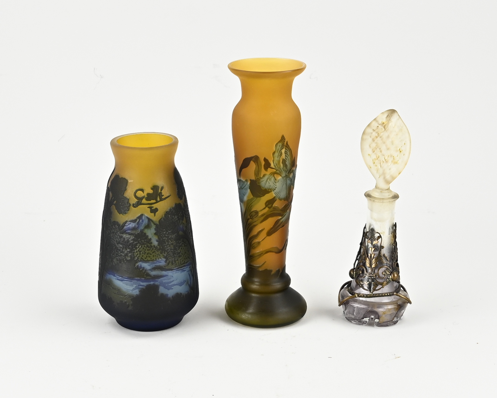 Three old glass vases