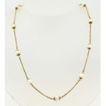 Gold necklace with pearls