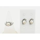 White gold earrings and ring with pearl