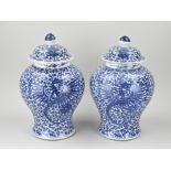 Two Chinese lidded vases, H 35 x Ø 22 cm.