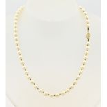 Necklace of cultured pearls with gold clasp