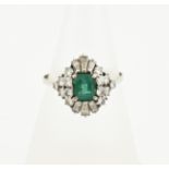 White gold ring diamond and emerald