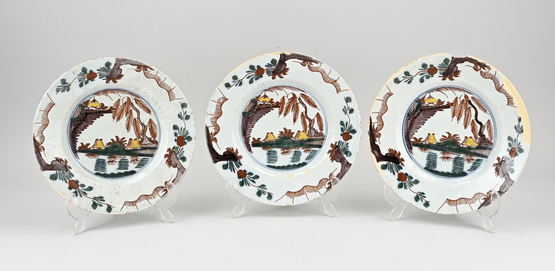 Three Delft plates Ø 22.8 cm.