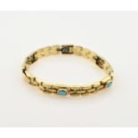 Gold link bracelet with turquoise