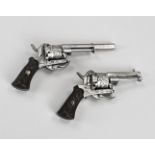 Two antique drum revolvers