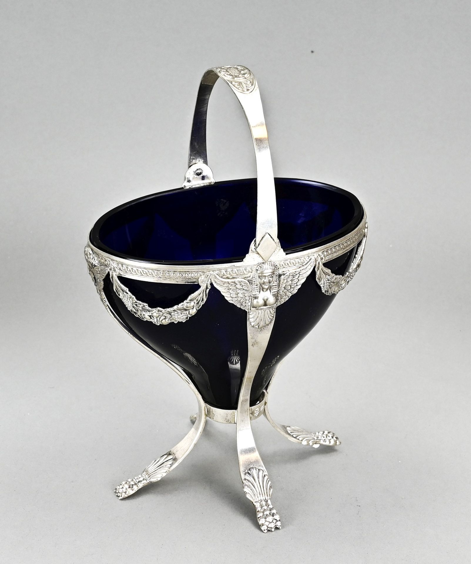 Silver sugar bowl with blue glass