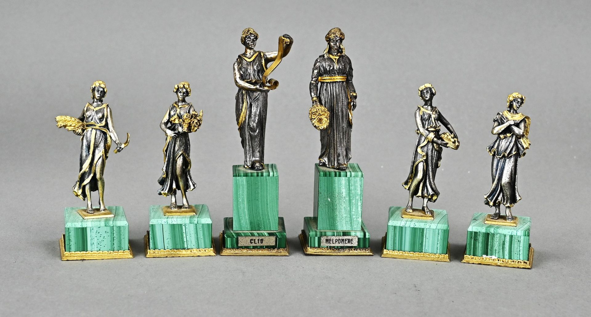 Six silver statues with malachite