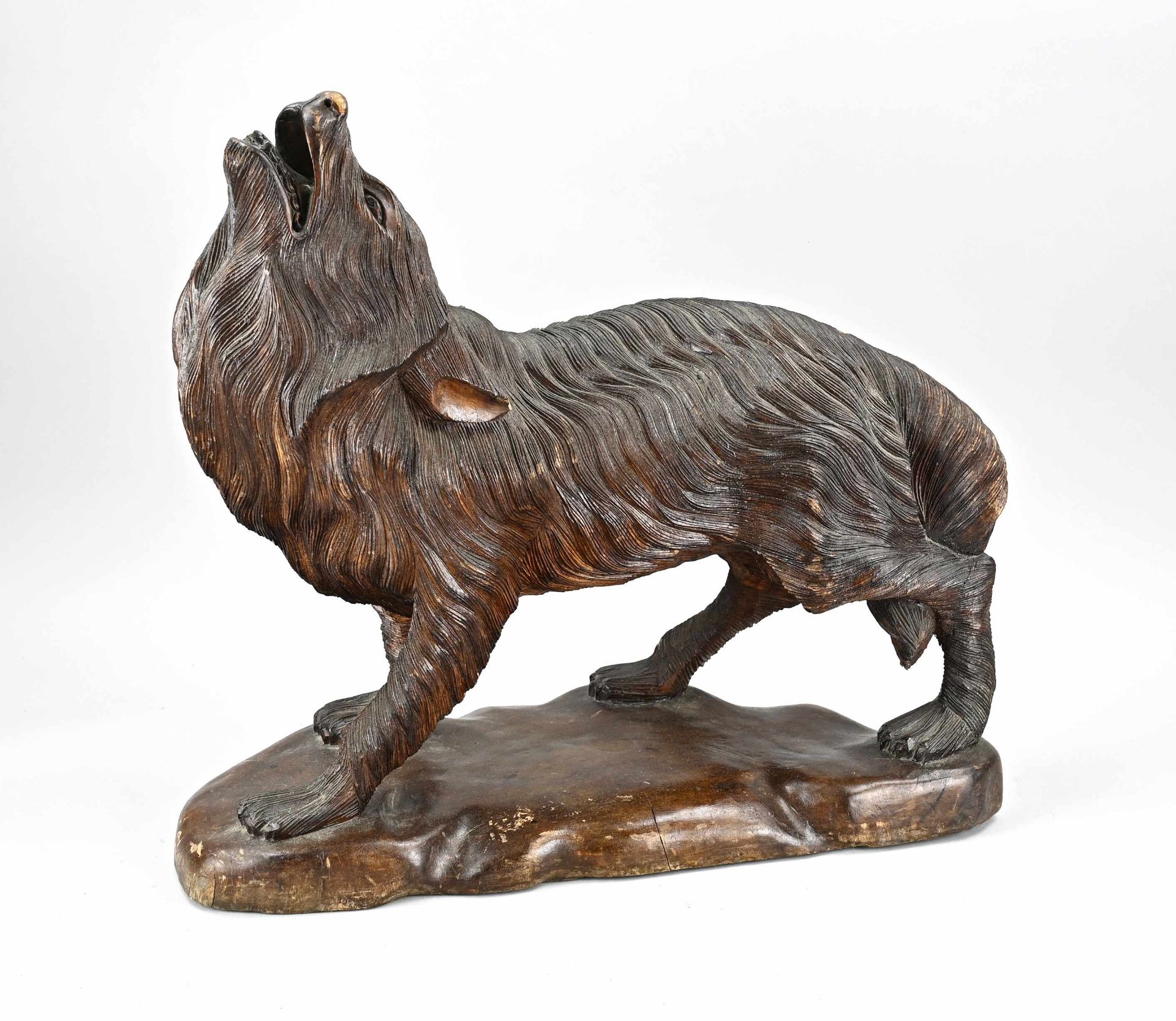 Wood-carved wolf, 1900