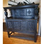 Handsome 18th Century Oak Court Cupboard with carved panels and frieze supported by baluster turned