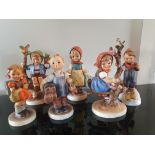 6 Vintage Goebel Figurines, Apple Tree Boy, Skier (one pole missing), Apple Tree Girl, Boots, Mother