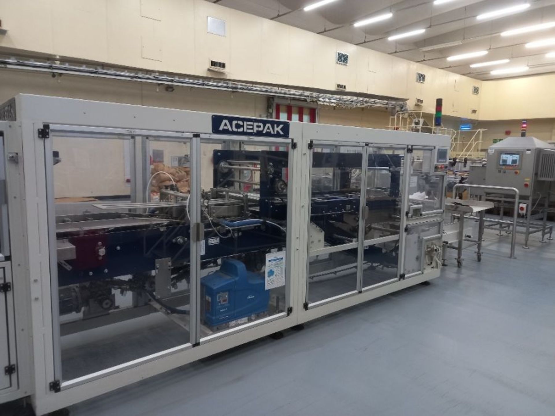 ACEPAK AUTOMATIC TRAY ERECTOR AND SHRINKWRAPPER - Image 2 of 12