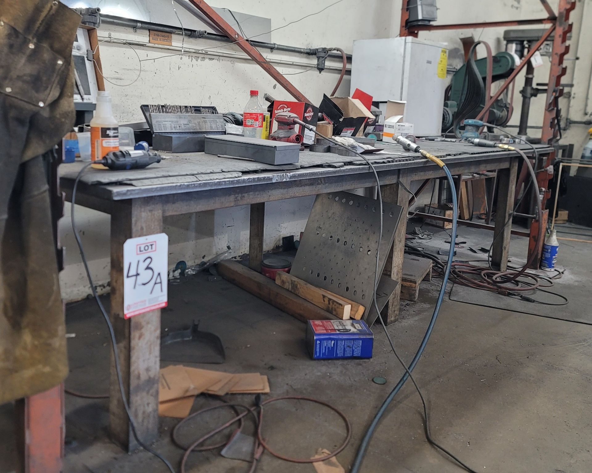 WELDING TABLE W/ 10' X 4' X 1" THICK STEEL TOP, CONTENTS NOT INCLUDED