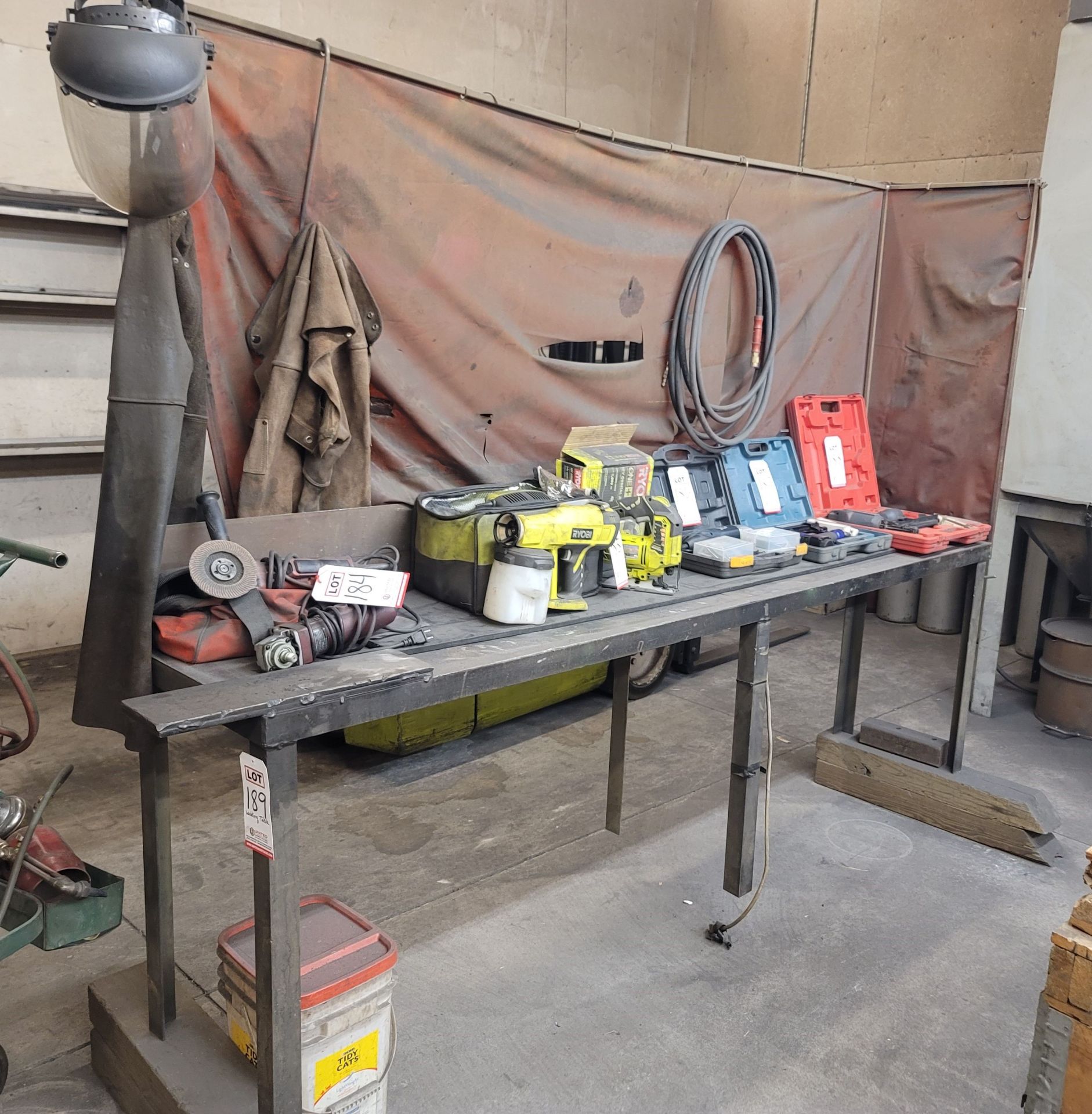 WELDING TABLE, 10' X 18" X 1/4" TOP, W/ CURTAIN, ITEMS ON TOP OF TABLE NOT INCLUDED