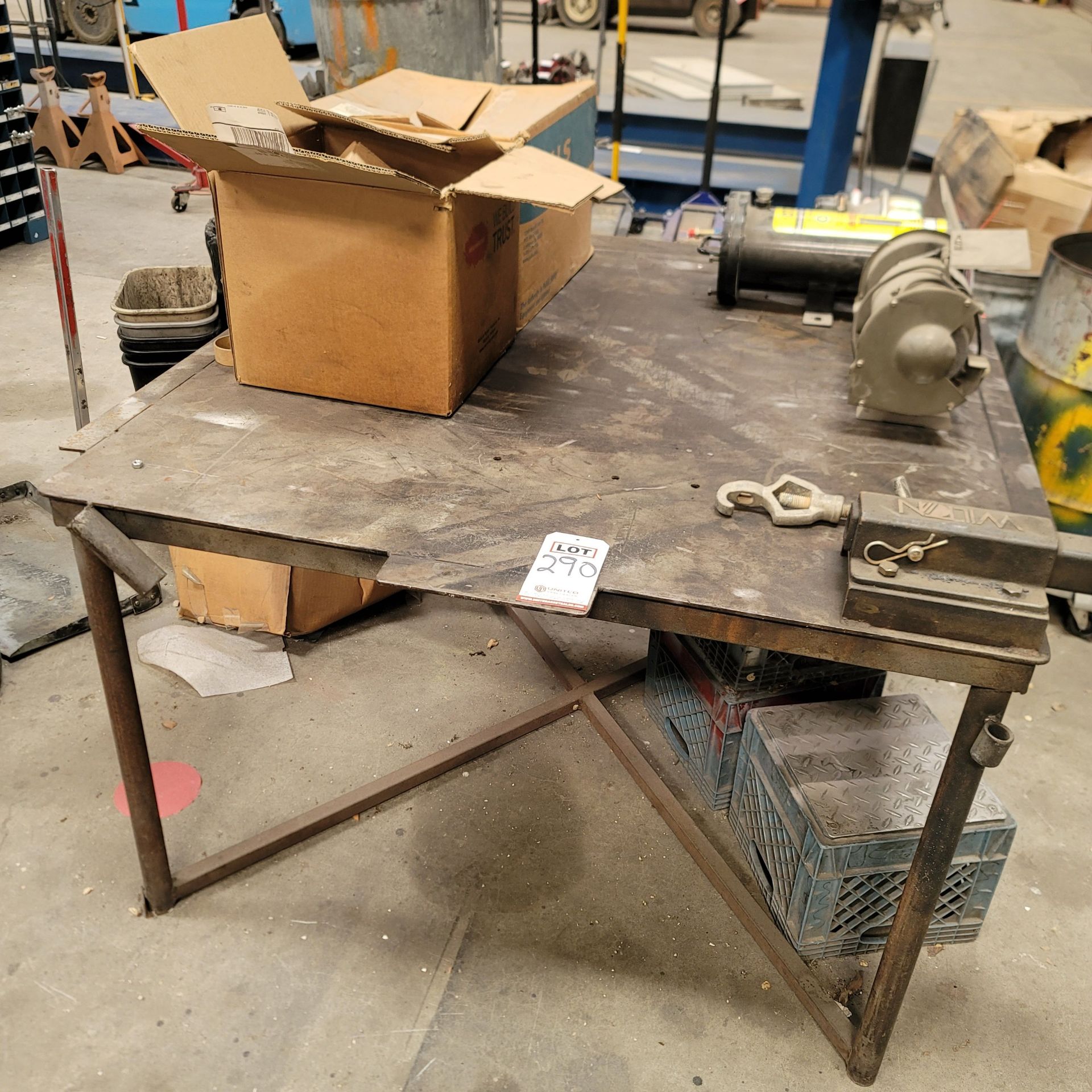 WELDING TABLE W/ 4' X 58" X 1/4" STEEL TOP, VISE AND OTHER CONTENTS NOT INCLUDED