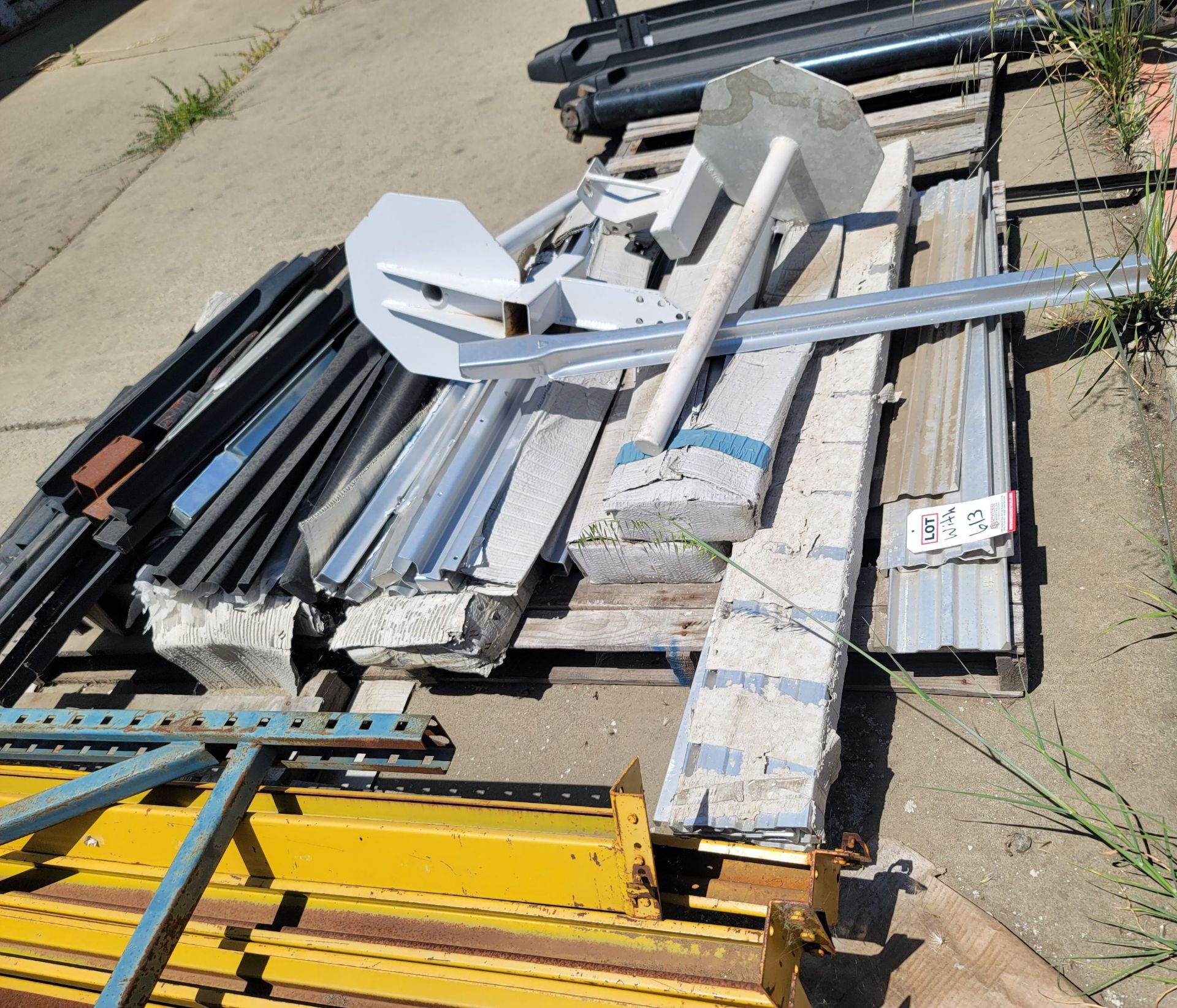 LOT - (4) PALLETS OF METAL, INCLUDES GALVANIZED TREAD CHANNEL AND PALLET RACK BEAMS