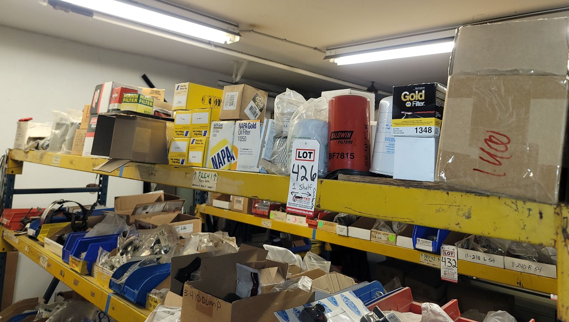 LOT - CONTENTS ONLY OF (1) 10' SHELF, TO INCLUDE: OIL AND OTHER FILTERS, PNEUMATIC CYLINDER