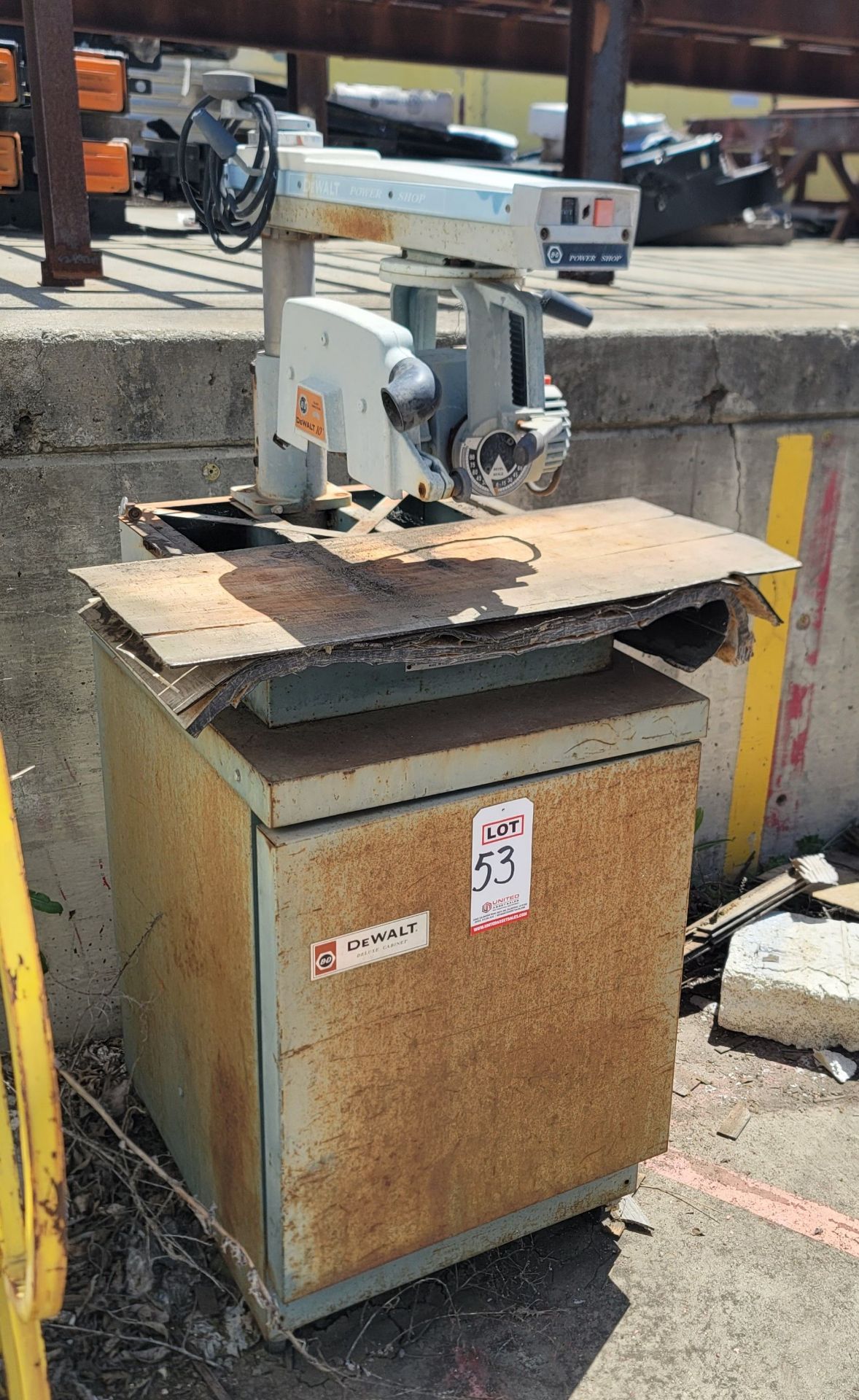 DEWALT POWER SHOP 10" RADIAL ARM SAW, W/ STORAGE CABINET BASE, NO SAW BLADE