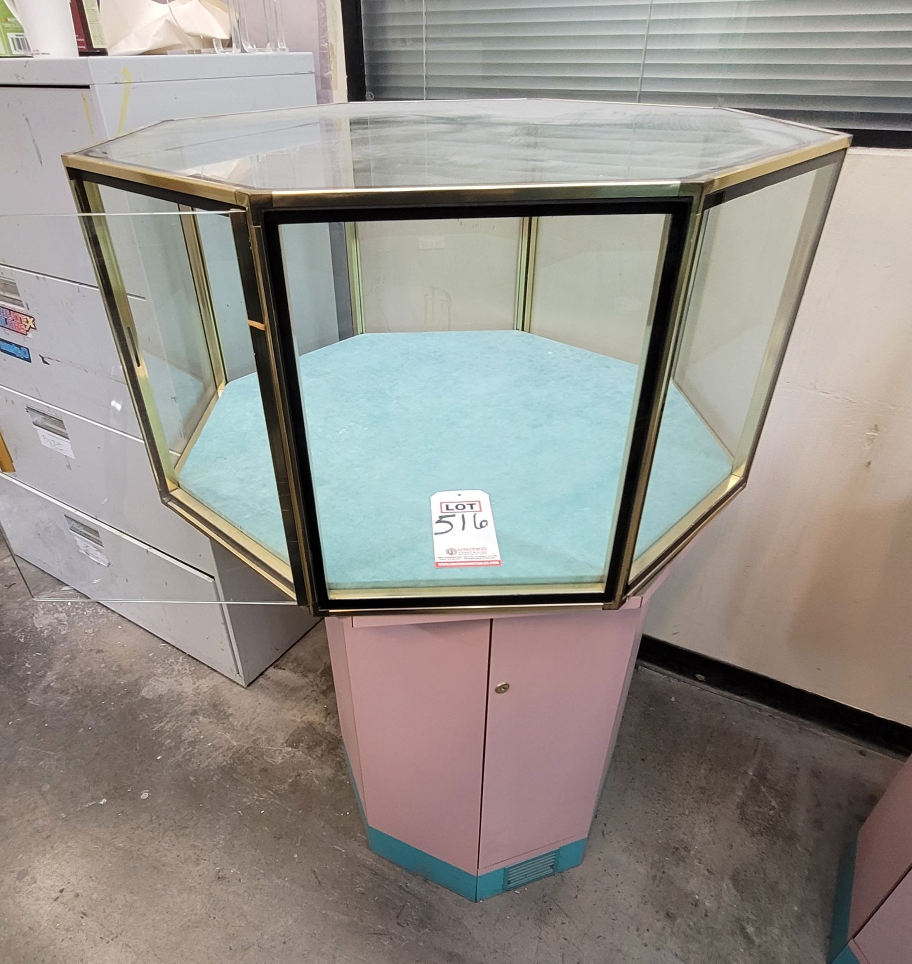 OCTAGONAL DISPLAY CASE, 34" DIA. X 18" HT, ON 31" PEDESTAL, W/ KEYS, PEDESTAL DOUBLES AS STORAGE