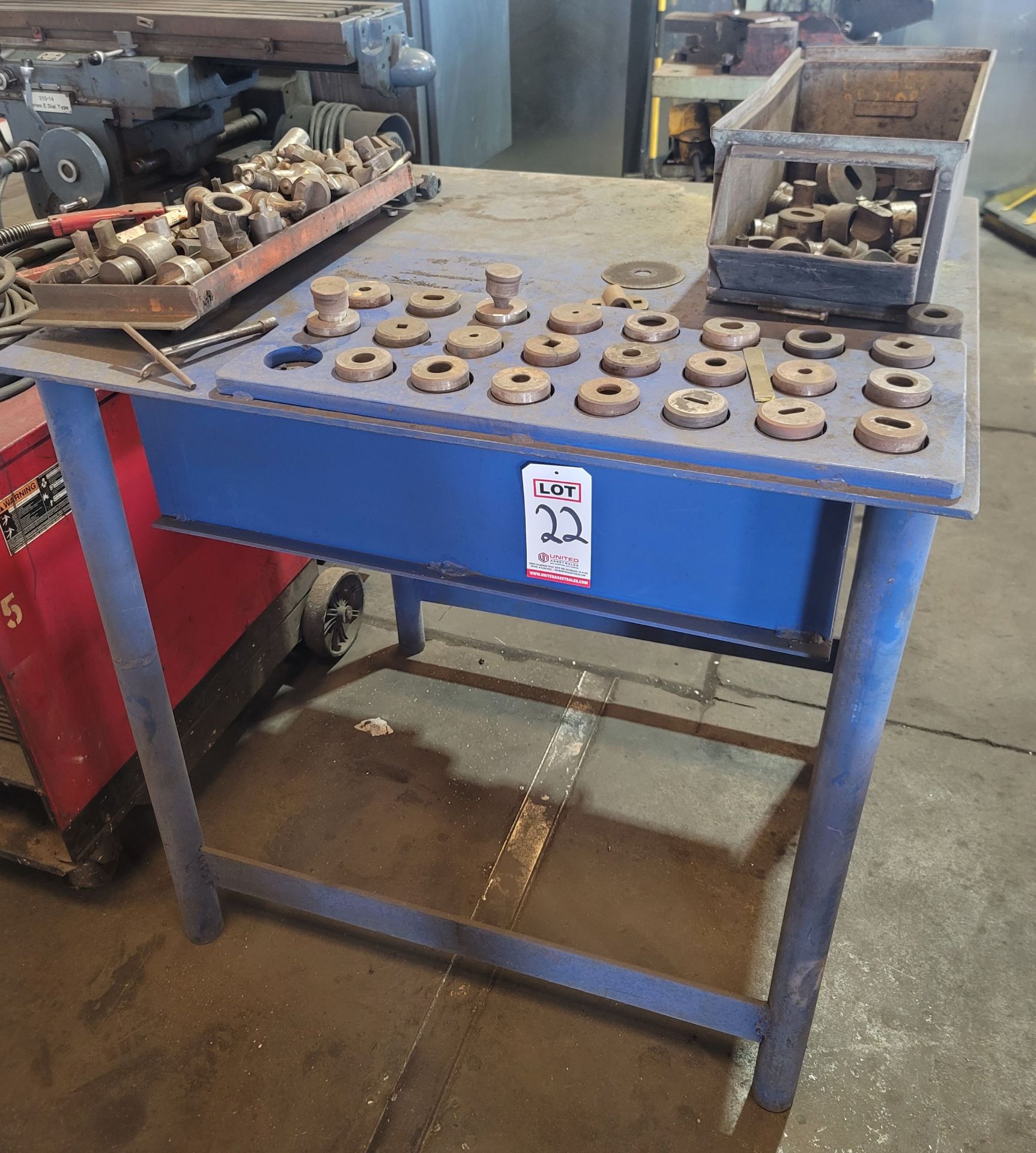 LOT - IRONWORKER PUNCHES AND DIES, W/ STEEL TABLE 42" X 36" X 41-1/2" HT, (MADE FOR USE W/ THE P70