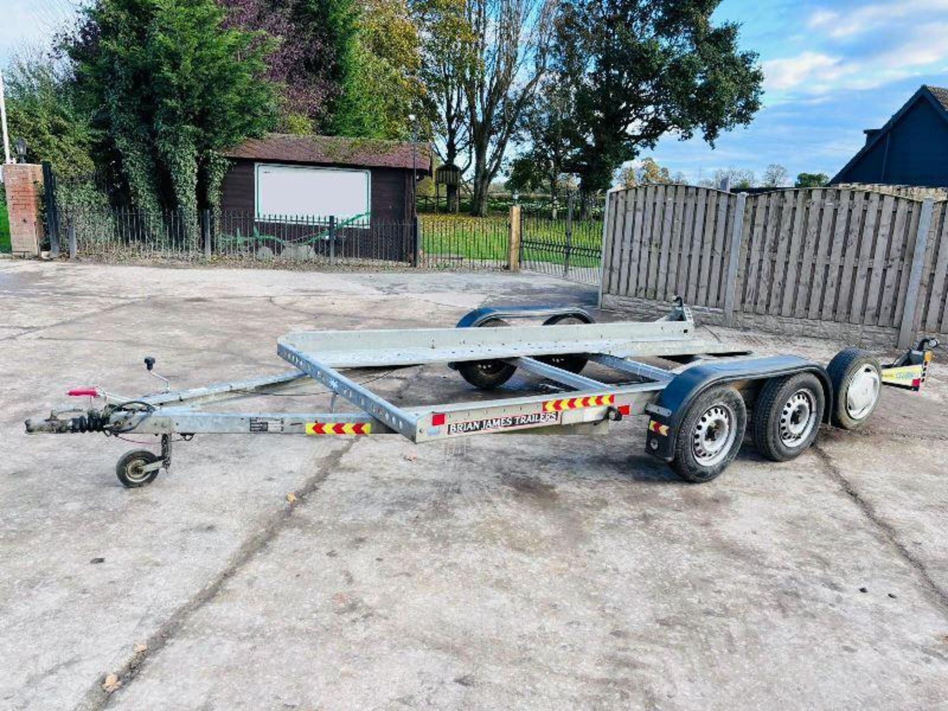 BRIAN JAMES TWIN-AXLE CAR TRANSPORTER TRAILER C/W LOADING RAMPS. - Image 2 of 11