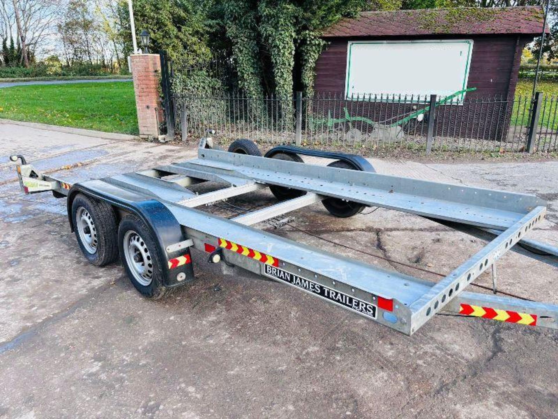 BRIAN JAMES TWIN-AXLE CAR TRANSPORTER TRAILER C/W LOADING RAMPS. - Image 4 of 11