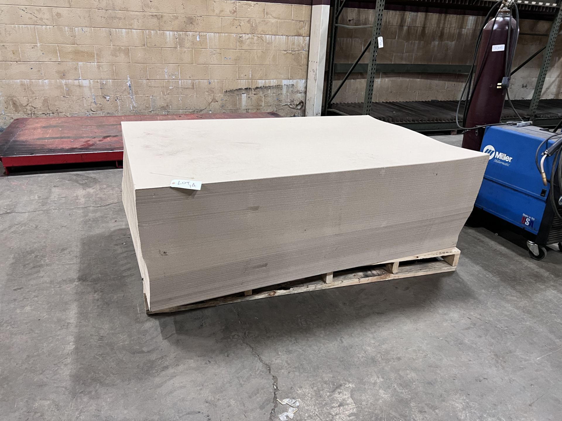 Lot - Skid with 8' x 4' Cardboard Sheets