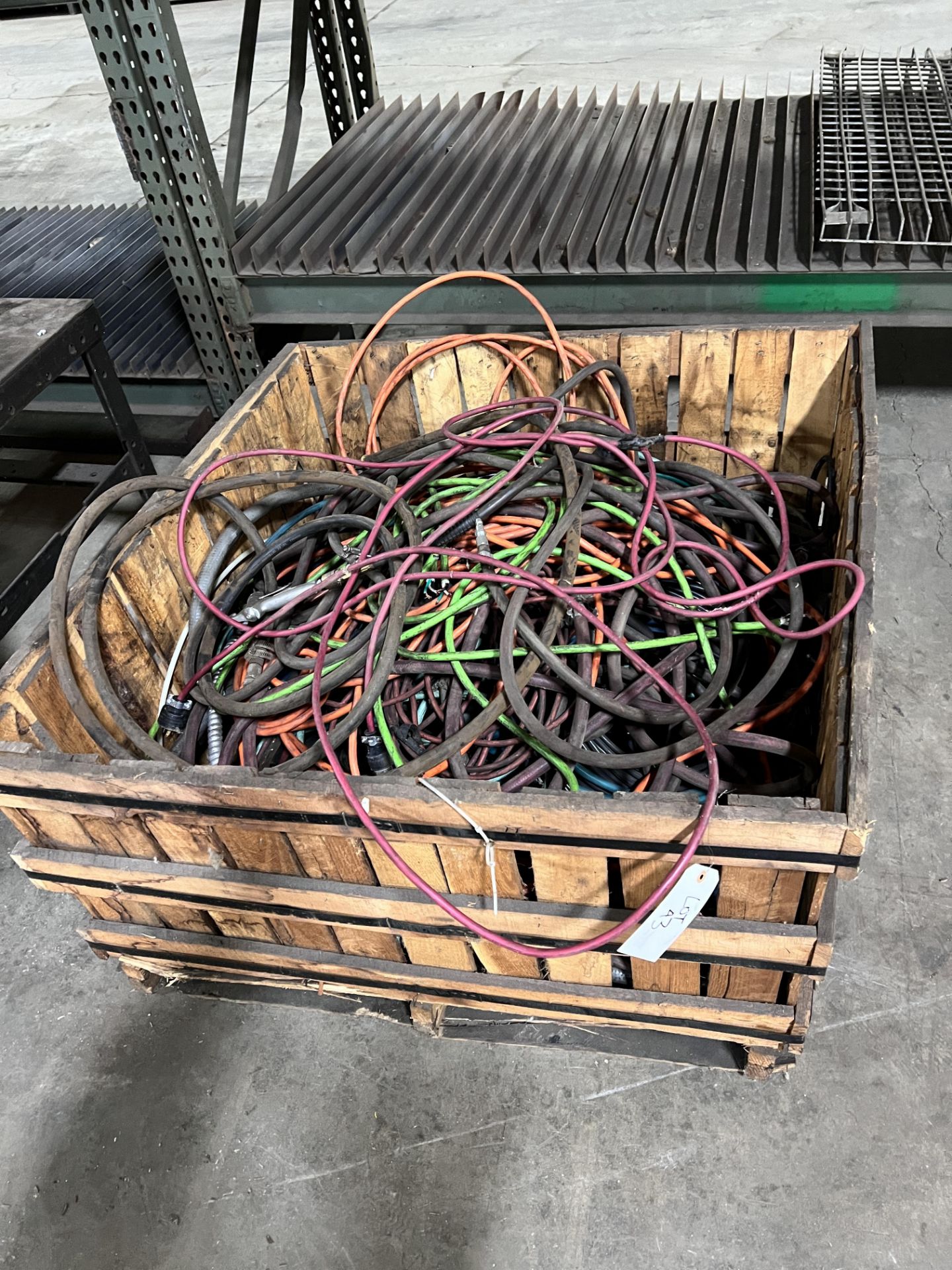 Basket of air hoses and electrical cords