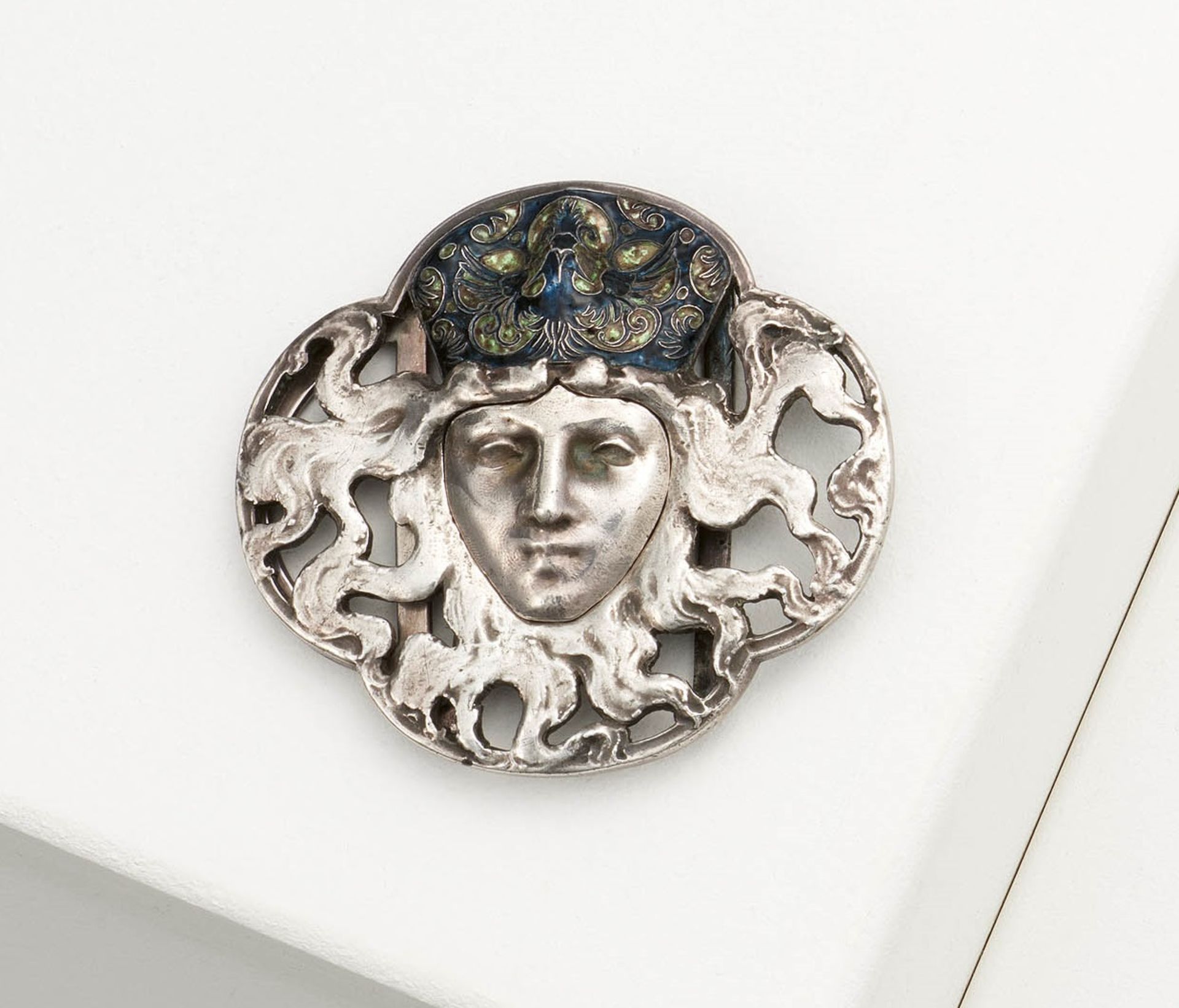 Art Nouveau belt buckle with female mascaron