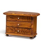 Germany: SMALL MODEL CHEST OF DRAWERS WITH FLORAL INLAYS MADE OF WOOD AND BONE