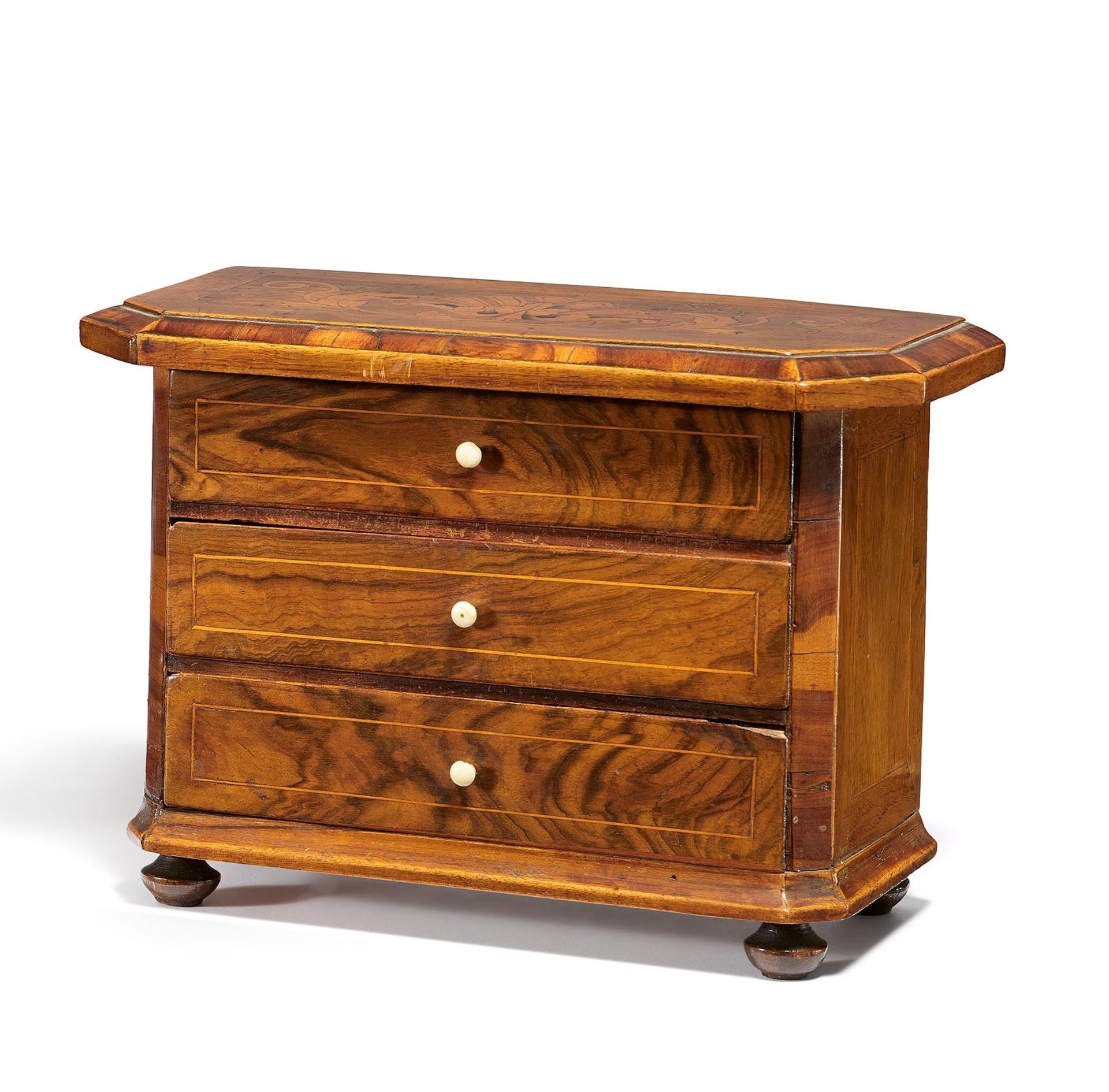 Germany: SMALL MODEL CHEST OF DRAWERS WITH FLORAL INLAYS MADE OF WOOD AND BONE