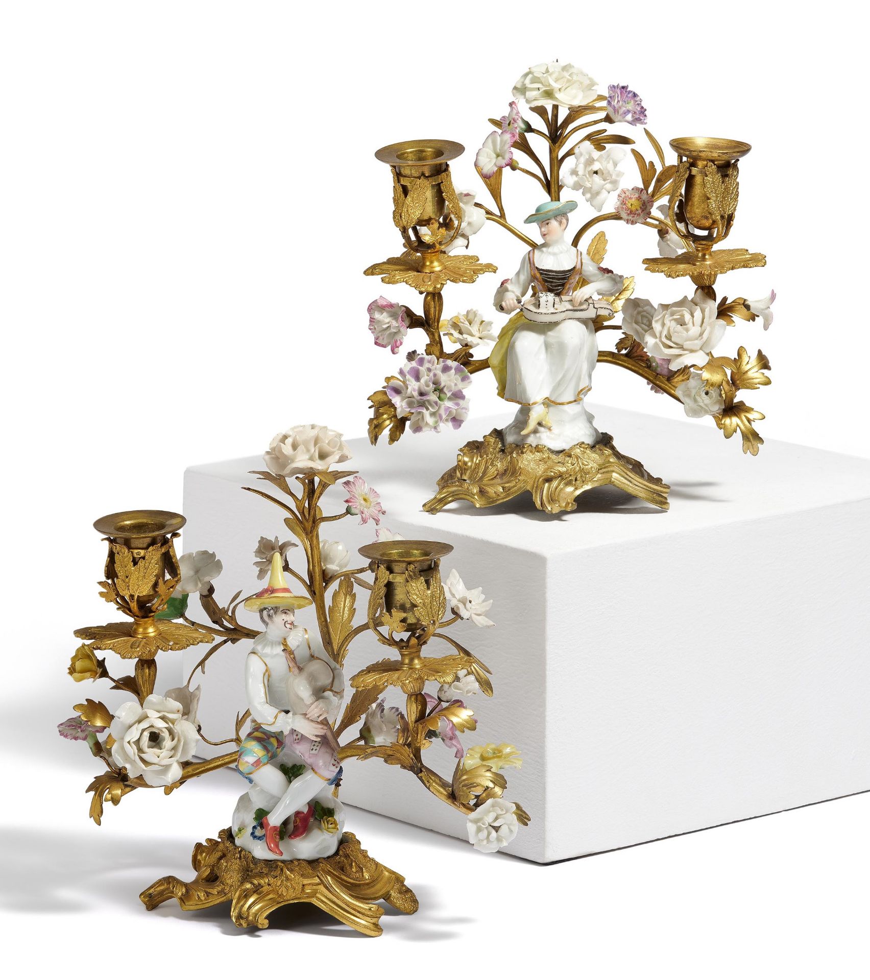 France: PAIR OF GILT BRONZE CANDELABRAS WITH TENDRIL BRANCHES AND PORCELAIN MUSICIANS