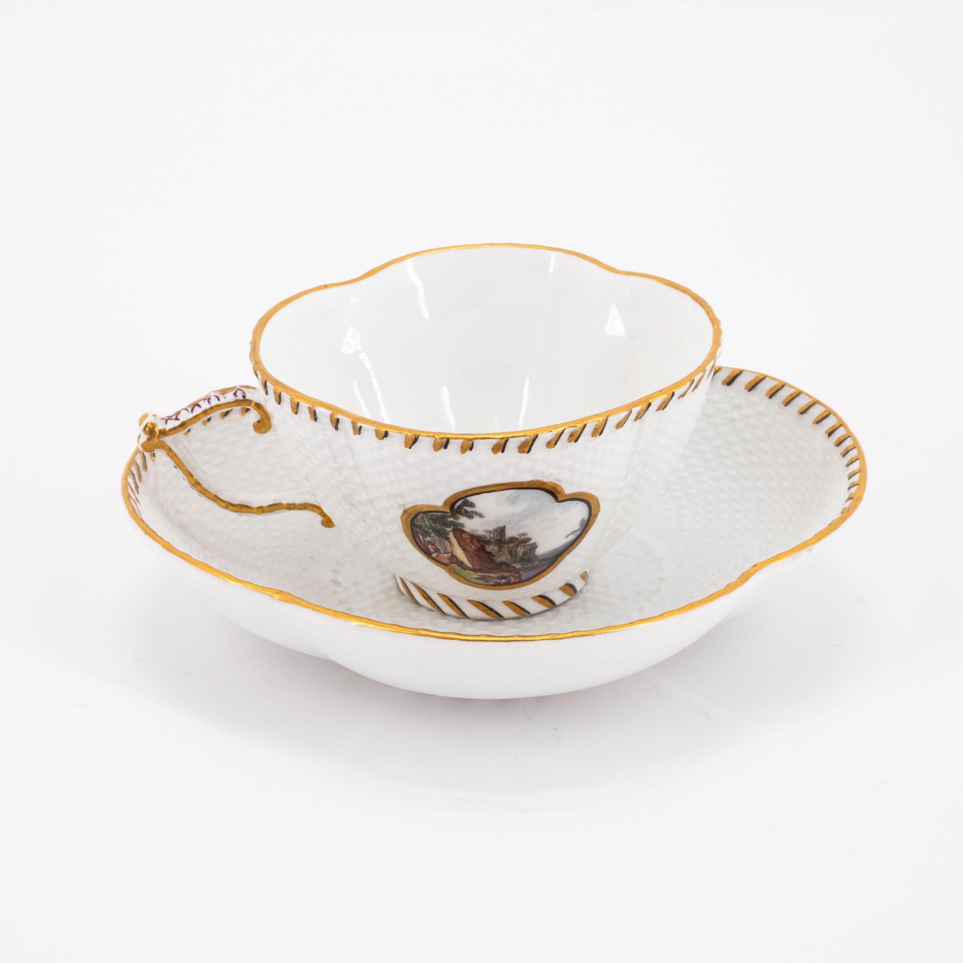 Meissen: PORCELAIN CUP AND SAUCER WITH LANDSCAPE CARTOUCHES AND BASKET WEAVE RELIEF