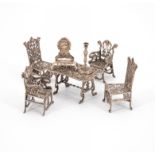 Germany: SILVER MINIATURE SET OF SALON FURNITURE, MINIATURE CANDLESTICK AND PENDULE