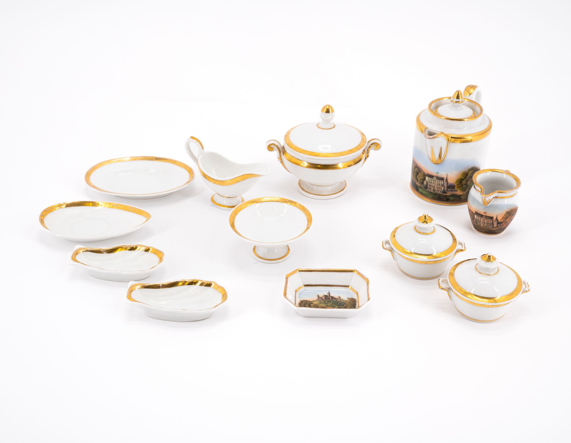 ENSEMBLE OF A PORCELAIN MINIATURE SERVICE WITH GILT EDGING AND MINIATURE COFFEE SERVICE WITH LANDSCA