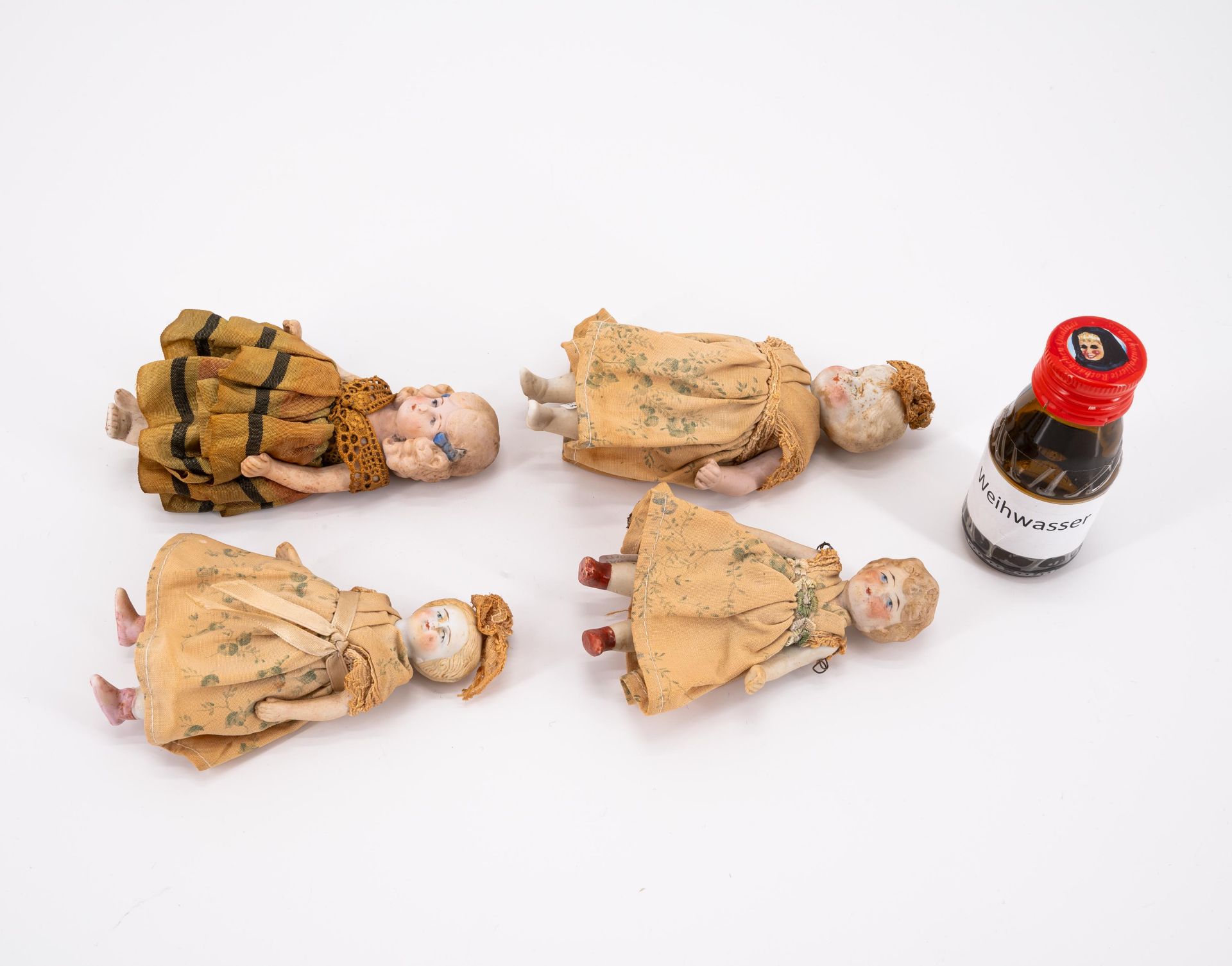 DOLL IN NUN'S HABIT, FOUR BISQUE PORCELAIN HEAD DOLLS AND A DOLL'S HEAD MADE OF PORCELAIN, TEXTILE,  - Image 4 of 5