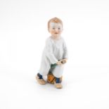 Meissen: PORCELAIN FIGURINE OF A BOY WITH STICK AND DRUM