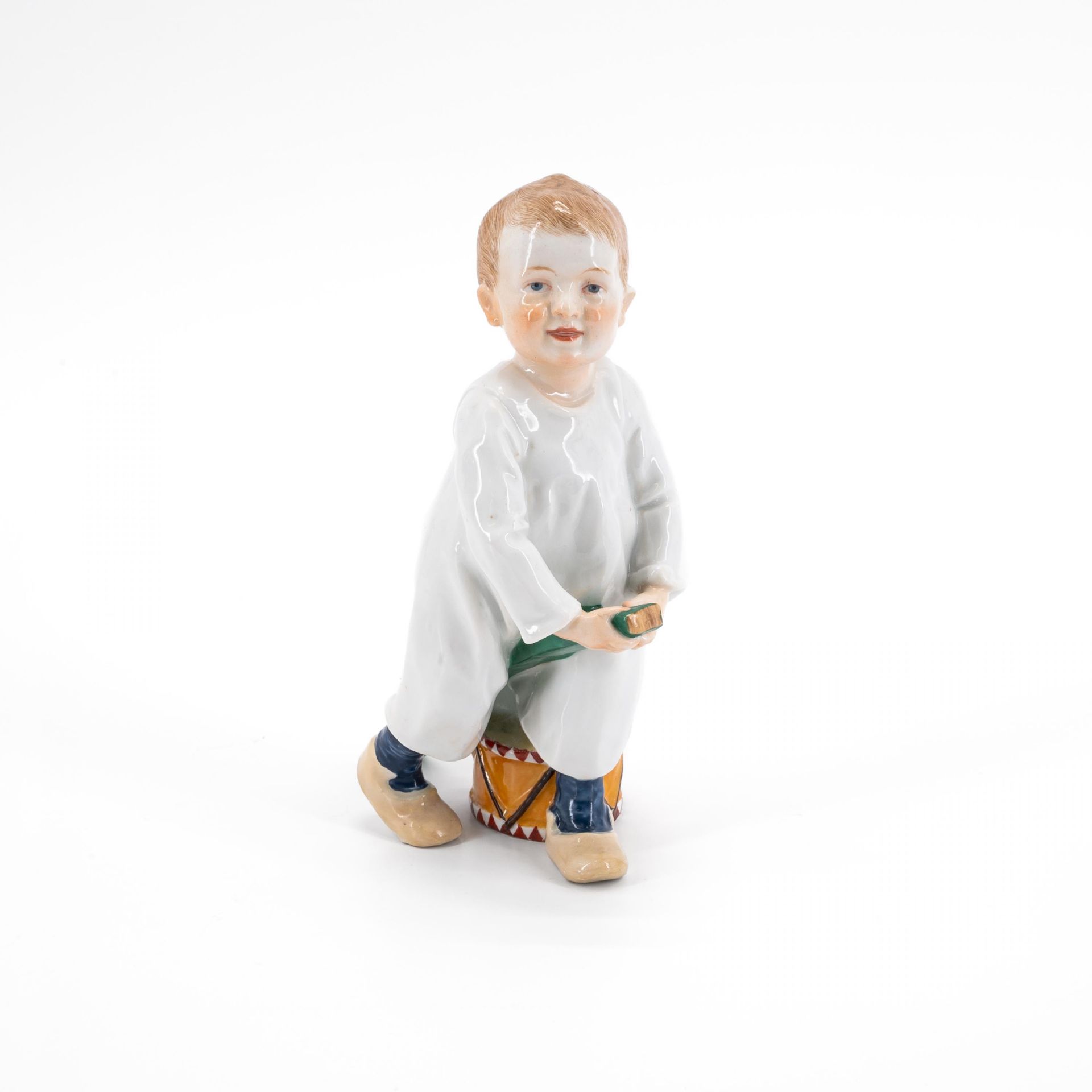 Meissen: PORCELAIN FIGURINE OF A BOY WITH STICK AND DRUM