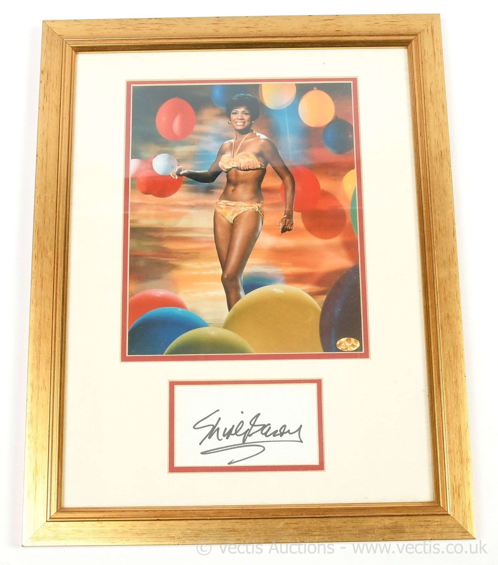 Shirley Bassey framed autograph and colour photo