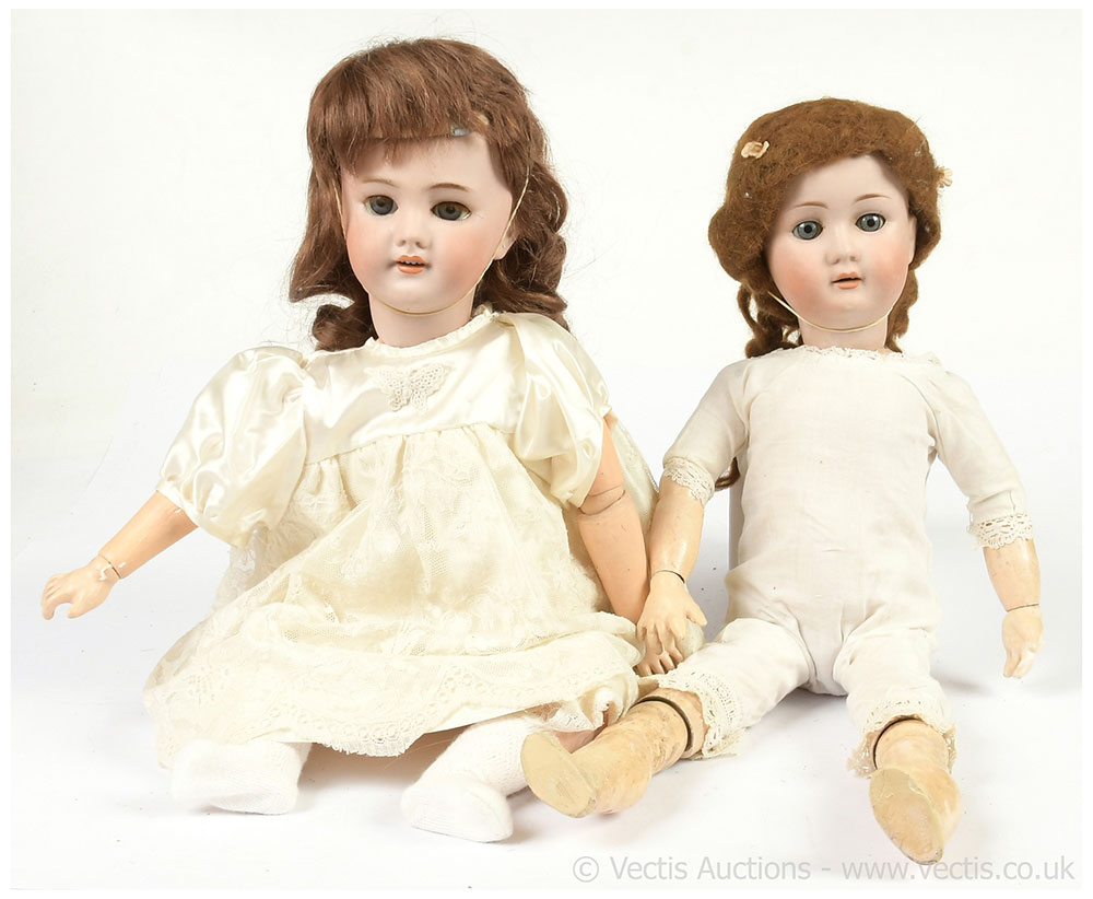 PAIR inc Pair of antique bisque dolls