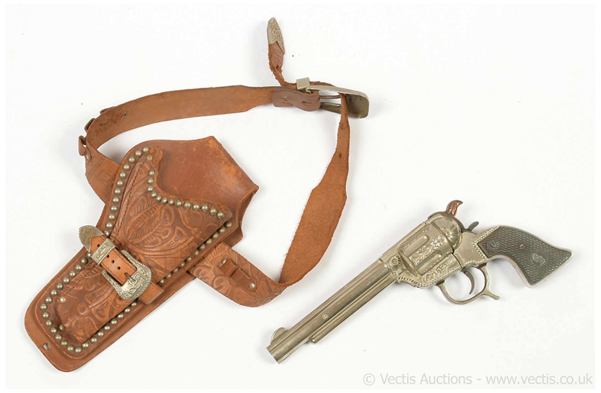 Roy Rogers vintage toy cap gun and leather